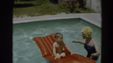 North Hollywood California (1961): Women With Shower Cap And A Small Boy On A Raft