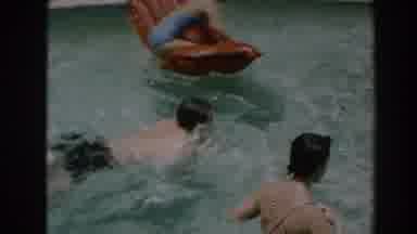 North Hollywood California (1961): Men And Women Swimming In The Pool On A Hot
