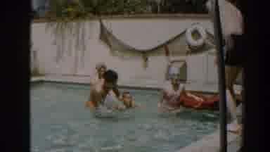North Hollywood California (1961): Several Adults A Child And A Dog Enjoy Swimming