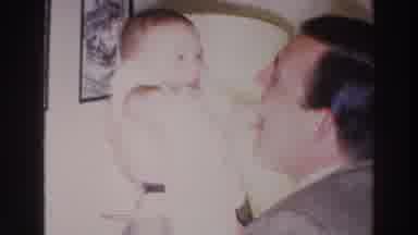 Madison Wisconsin (1966): A Dad Kissing His Baby
