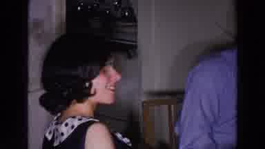 Madison Wisconsin (1966): Young Woman Showing Off Her Cigarette As Skeptical Male