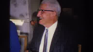 Madison Wisconsin (1966): An Elderly Man And Woman Sitting At A Table Laugh