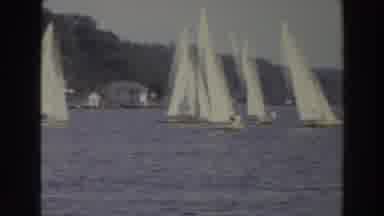 Madison Wisconsin (1966): A Collection Of Identical Canoes Sailing On The Sea In