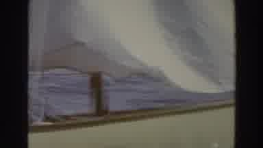 Madison Wisconsin (1966): A Young Man And A Boy Riding On A Small Sailboat As The