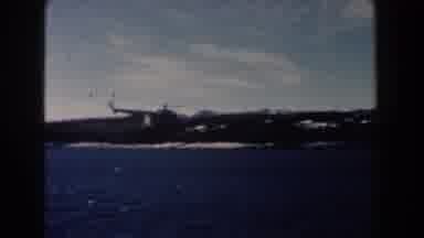 Dearborn Michigan (1960): Helicopter Crosses Deep Blue Ocean