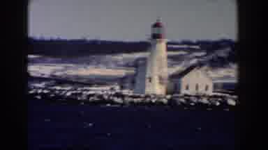 Dearborn Michigan (1960): A Few People In A Boat On The Water Set Their Sites On