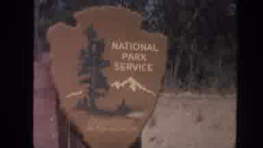 Arizona (1962): Entrance Sign Post For Grand Canyon National Park And A Business