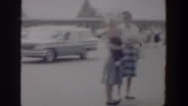 Lubbock Texas (1958): Camera Pans From Right To Left In Parking Lot Area With