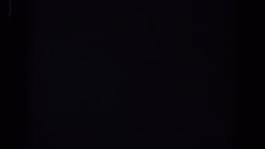 Lubbock Texas (1958): A Group Of Yellow Lights With Dark Black Screen