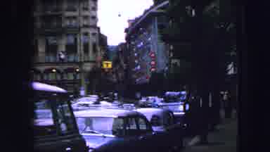 LUCERNE SWITZERLAND-1963: Old Footage Of Classic Cars And People Walking In A Street