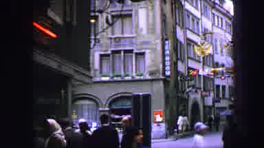 LUCERNE SWITZERLAND-1963: View Of Tan And Green Building On A Clear Day