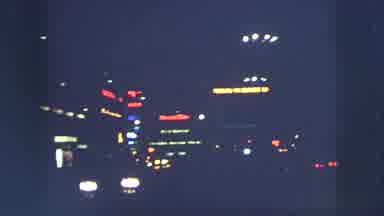 ZURICH SWITZERLAND-1963: Nighttime City Lights and Urban Movement
