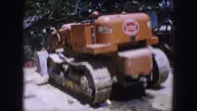 Dallas Texas (1964): A Collection Of Truck And Caterpillars Packed In The Farm