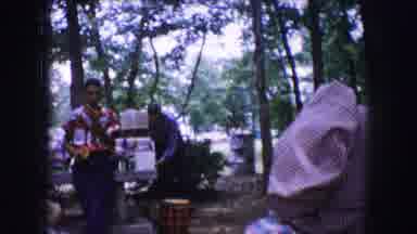 Dallas Texas (1964): A Man Walks To Get His Food As He Passes Woman Eating On