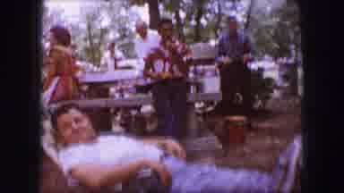 Dallas Texas (1964): Elderly Woman Walks By Two Other Women Relaxing On A Chair