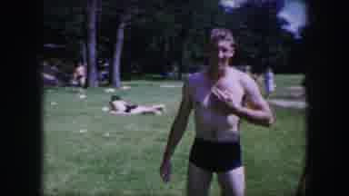 Dallas Texas (1964): Couple With Swimwear And Wet Hair Walking In A Park With