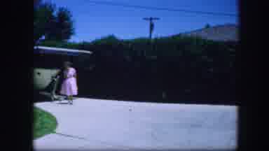 Fort Worth Texas (1964): A Woman Dressing A Pink Dress And Walking Out Of A Garage