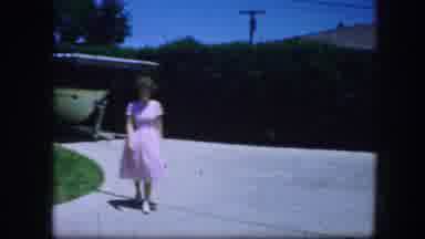 Fort Worth Texas (1964): A Woman Coming Out Elegant With Her Pink Dress Towards