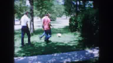 Lewisville Texas (1965): Three Men Pick Up A Ball Close To An Apartment