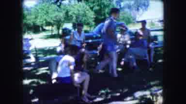 Lewisville Texas (1965): A Group Of Men And Women Having A Meeting And Laughing
