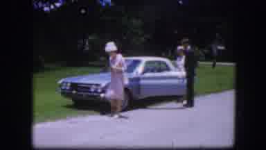 Kirksville Missouri (1967): Two Women And A Man Pose Next To Their Car