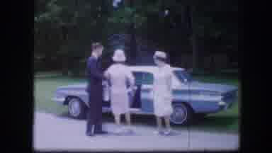 Kirksville Missouri (1967): A Man Walks Two Women Dressed In White Into The Car