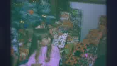 Blue Springs Missouri-1973: Woman in Red Shirt Talks to Girl in Pink Nightgown by Christmas Tree
