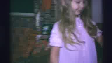 Blue Springs Missouri (1973): A Little Girl Showing To A Lady His New Red Watch