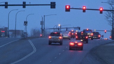 WESTMINSTER COLORADO-2015: Cars Changing Lanes at a Red Light