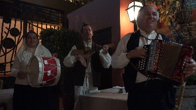 MADIERA PORTUGAL-2016: Three Men Wearing White Shirts Play Instruments In