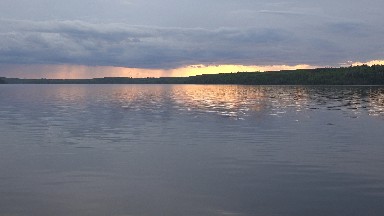 RED LAKE CANADA-2015: A Beautiful Sun Setting Over a Lake in the Evening