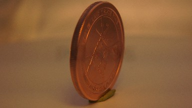 The Bronze Coin Depicts A History About Guns And Wars
