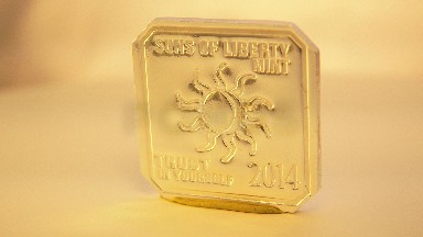 Sons Of Liberty Mint Square Coin Rotates On Stand For Animation