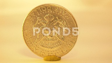 Coin On A Table Spinning In A Circle