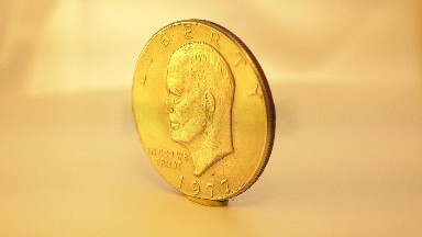 Mint Collectors Item Of A Spinning Coin Dated Fifty Years Ago