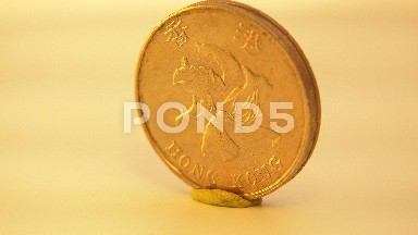 The Rotating Coin On Display Has Viewers Guessing The Value On Such A Prize