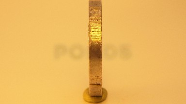 Rolling Golden Ten Dollars Coin With Year Inscribed On It