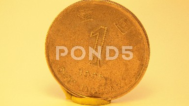 Gold Coin Turning Around To The Left