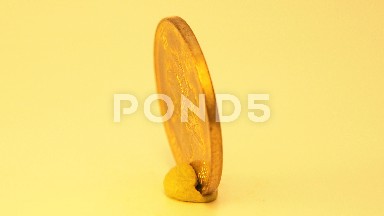 Spinning Coin On A Table In A Circle