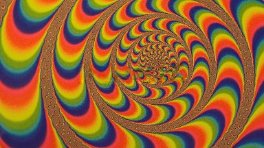 A View Inside Of A Kaleidoscope With Moving Colors In Waves