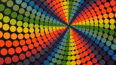 Spiral Background Screen Running With Many Balls Of Different Colors