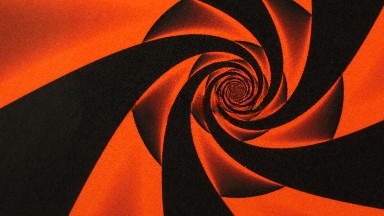 Static Red And Black Fractal Growing From The Center-Right Of The Screen And