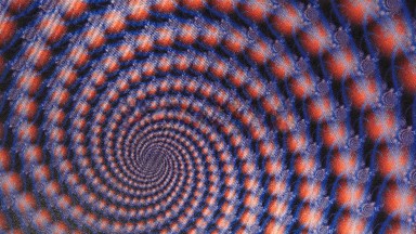An Optical Illusion With Red And Purple Circles