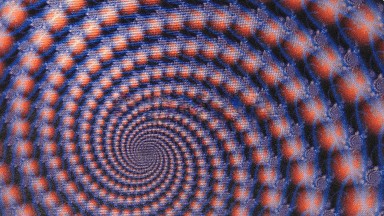 A Bottomless Spiral Motion Of Round Orange Beads Or Pebbles