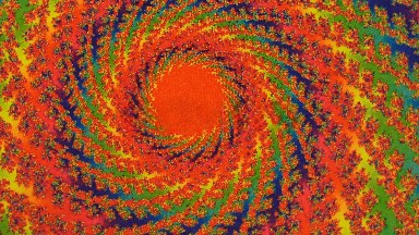 Multi color Swirling Background On A Rotation As The Colors Swirl Together