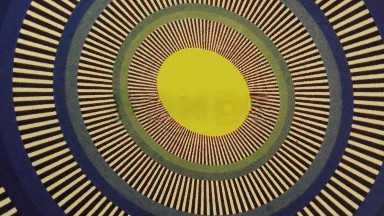 Spiral Image Of Oval Circles And Stick Moving In A Clockwise Motion