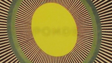 Spiral Image Of Oval Circles And Stick Moving In A Clockwise Motion