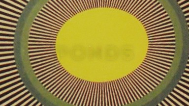 A Spinning Yellow Orb Surrounding By Rotating Black And White Lines