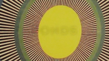 Animation Similar To A Predominant Red And Yellow Sun Rotating Clockwise