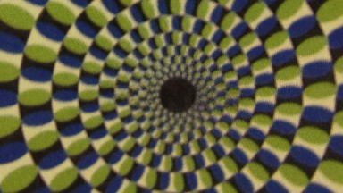 An Image Three D Spinning It Has The Colors Blue Light Green And White